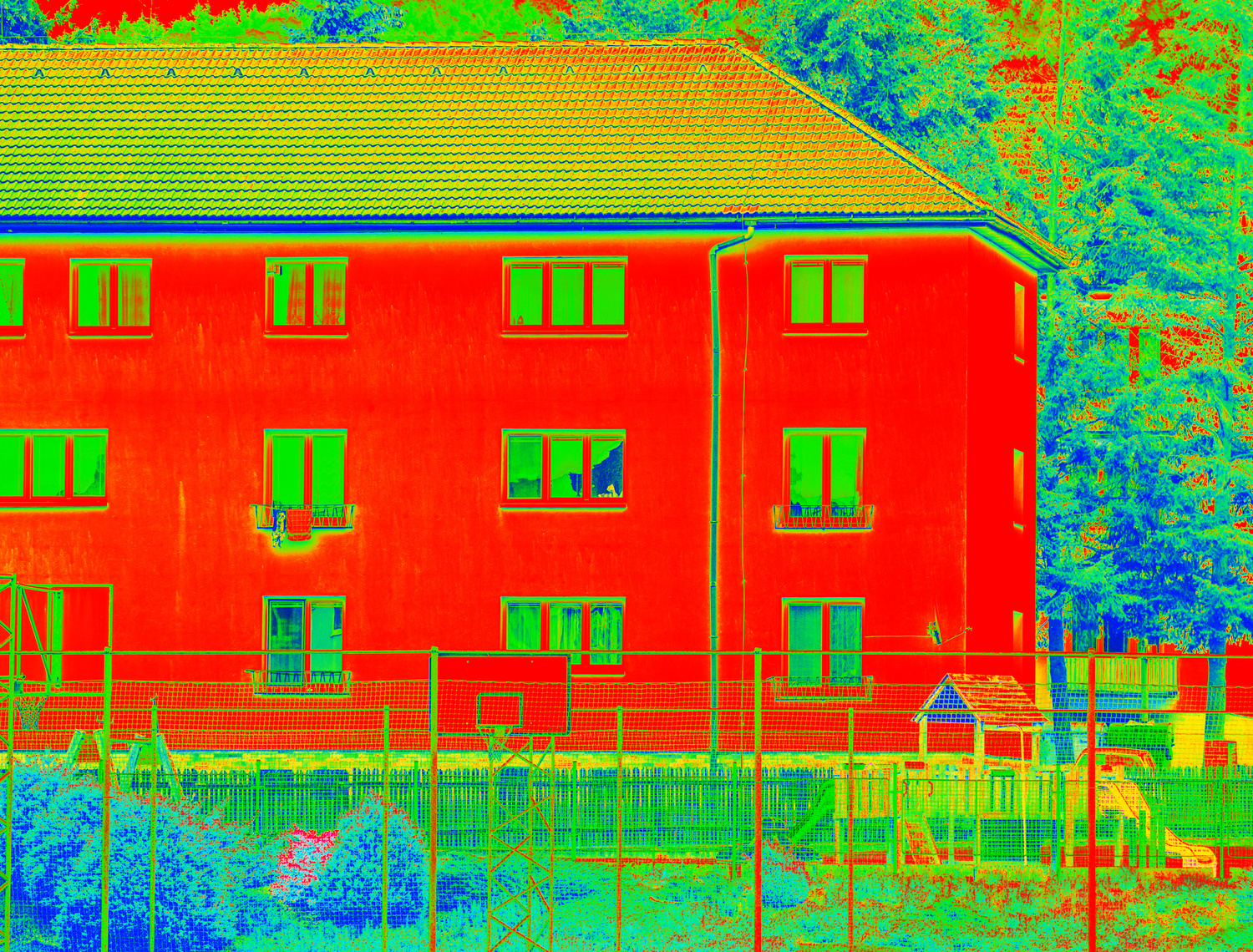 Infrared thermo vision shows thermal radiation from house